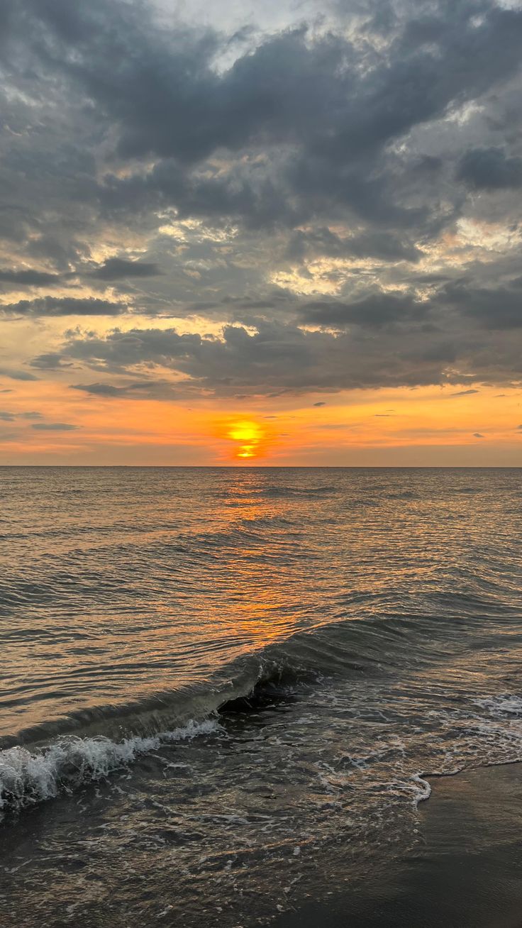 Beach sunset with dramatic clouds